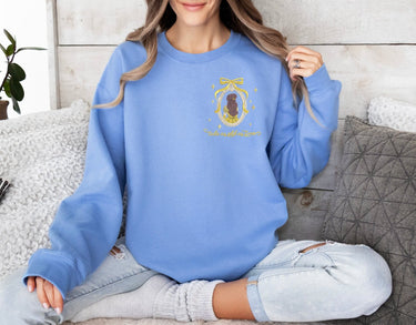 Carolina Blue Crewneck Embroidered Tale As Old As Time (Pre-Order)